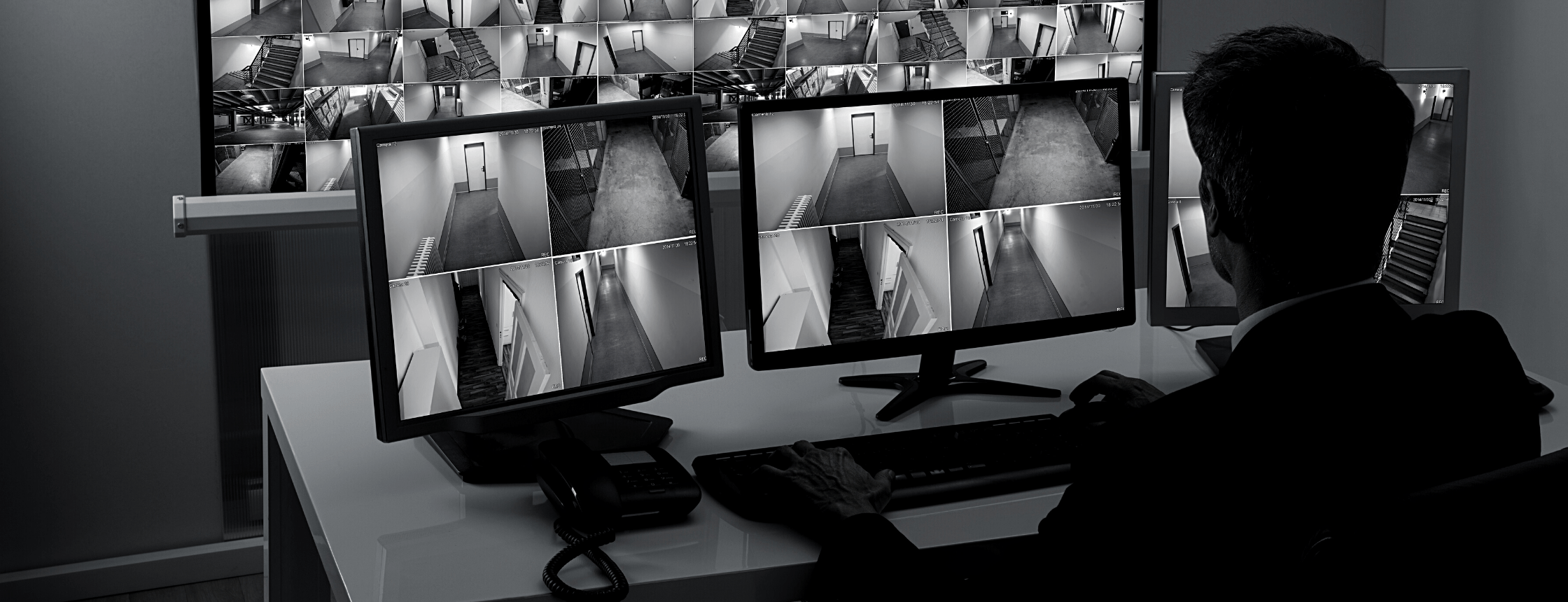Security Guard Viewing Security Footage